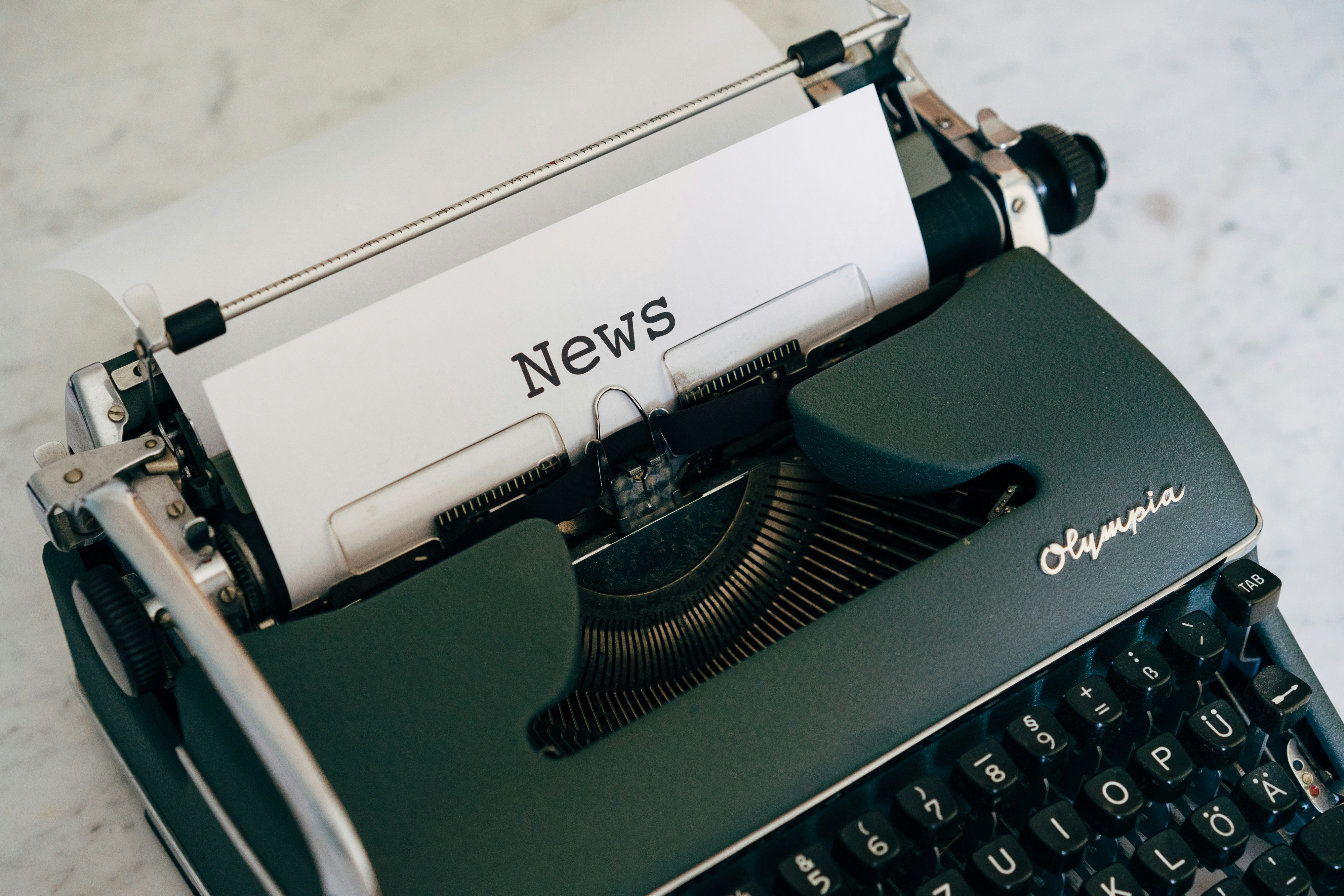 Vintage typewriter representing Geren Corporate articles and insights